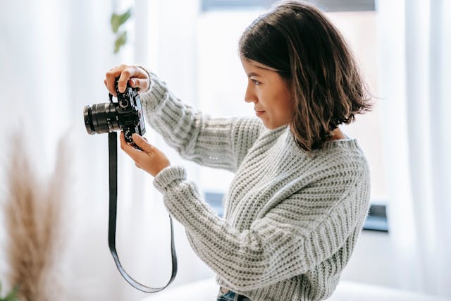 Person taking photos with a camera